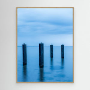 Stolpar i havet vid Viken – Höganäs, Skåne | Canvas